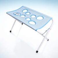 Soporte plegable PawSoak para baño de mascotas, vista de estudio